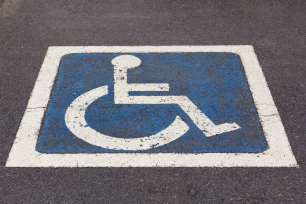 istock Disabled Parking sign at parking lot. 951823688
