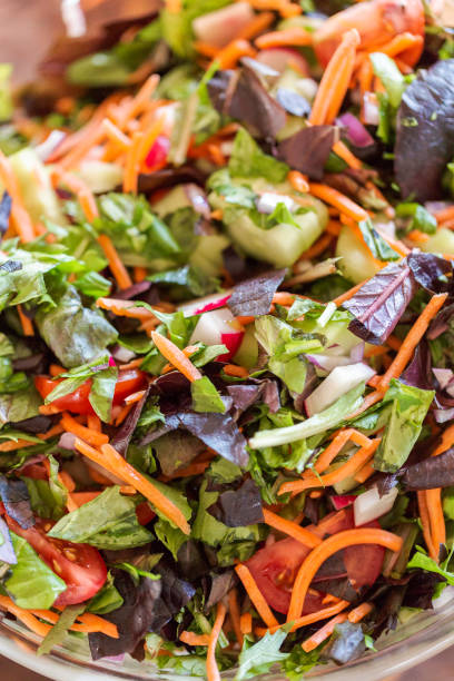 istock Preparing fresh salad with organic veggies. 951825206