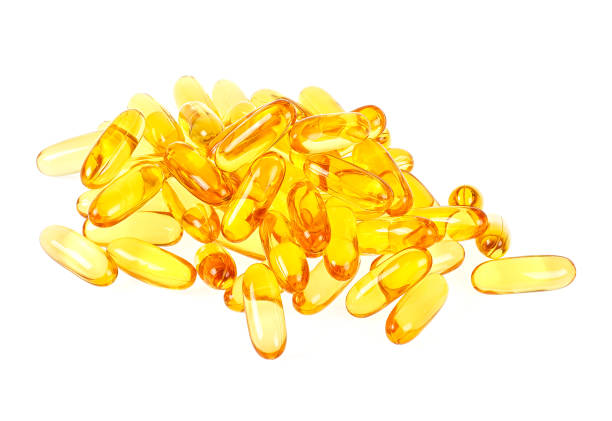 istock Cod liver oil omega 3 gel capsules isolated on white background 951840198