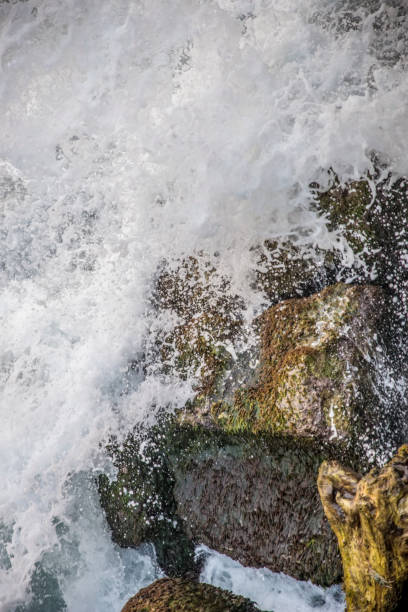 istock Watch the waves.Beating the rock sea wave 951845392