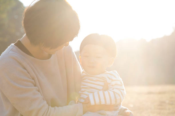 istock Mother and son relaxed in the park 951845750