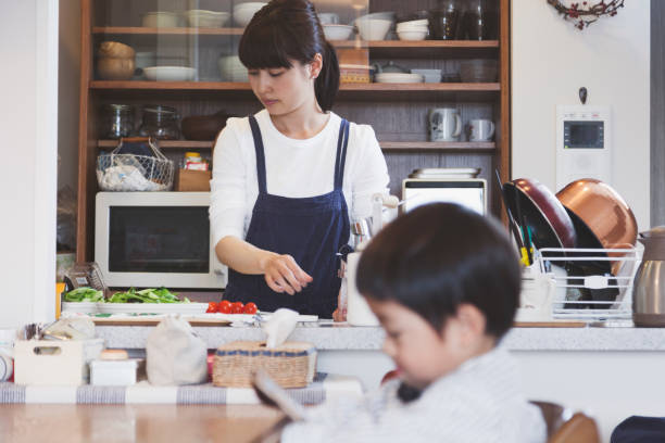 Mother and son in the dining kitchen at home