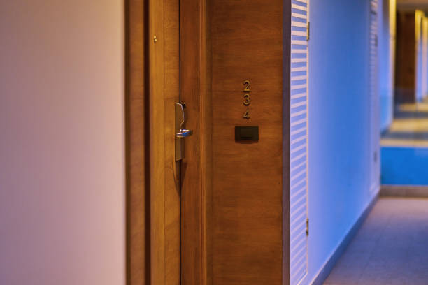 istock Hotel knob on door with door bell with fluorescent light 951847494
