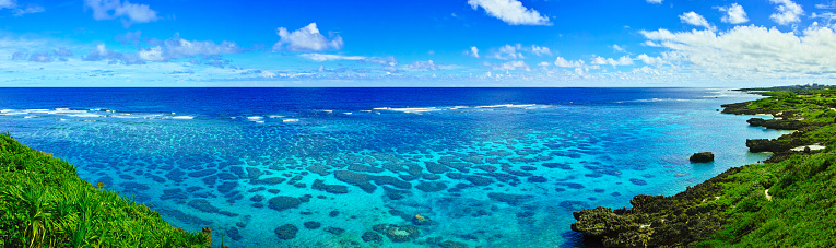 Miyakojima in summer. Sea of coral reef to see from Im Gya Marine Garden (Panorama)