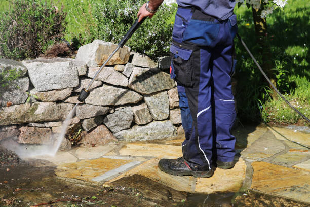 Working with high-pressure cleaner stock photo