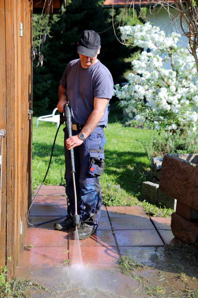 Working with high-pressure cleaner stock photo