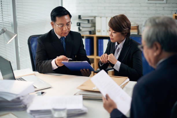 istock Lawyer and intern working together 951859298