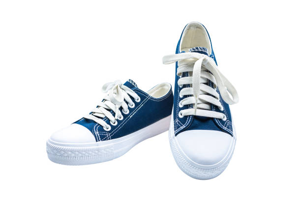 istock Sneakers dark blue thick fabric. Isolated on white background. 951859400