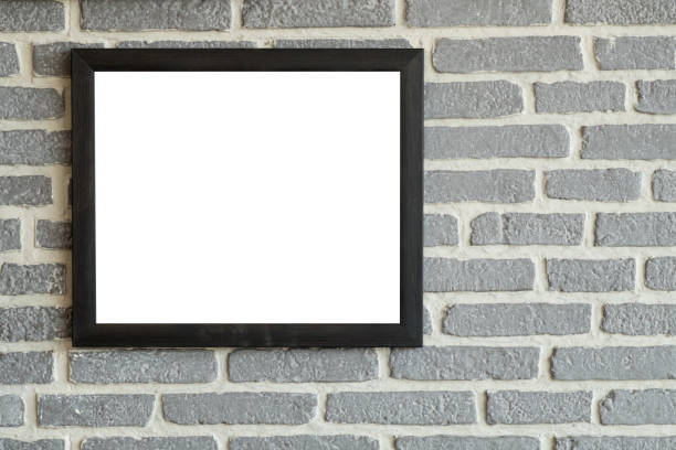 istock Mock up blank poster picture frame on brick wall. 951860070