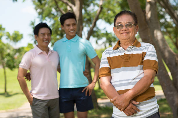 istock Cheerful senior man with his family 951860436