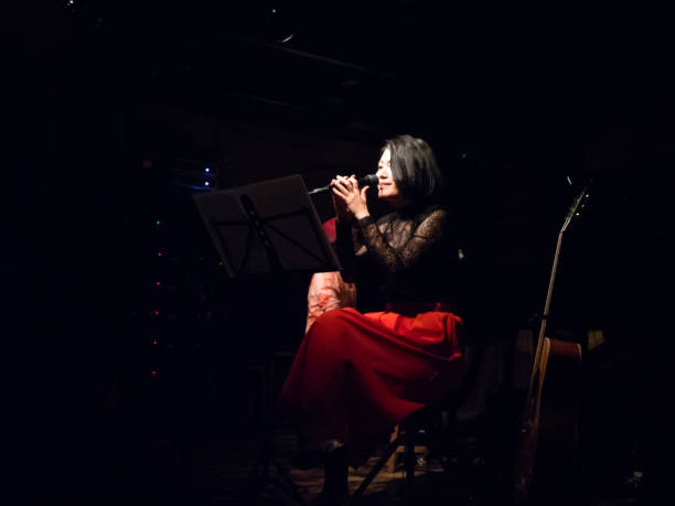 istock Asian musician performing on stage 951864060