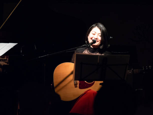 istock Asian musician performing on stage 951864252