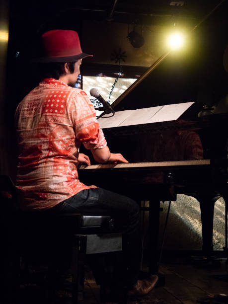 istock Asian pianist performing on stage 951864282