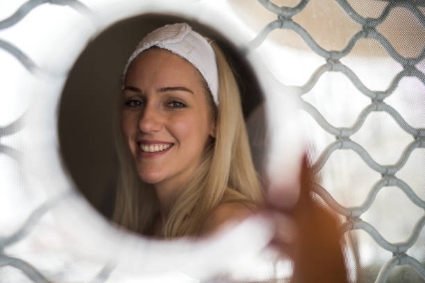 istock Reflection beauty women in the mirror 951864316