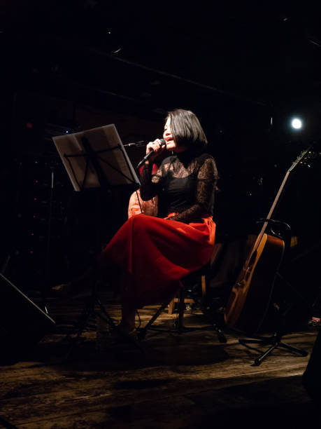istock Asian musician performing on stage 951864420