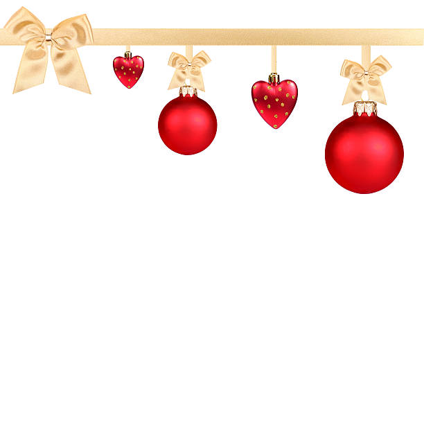 Red Christmas balls hanging with golden ribbons on white background stock photo
