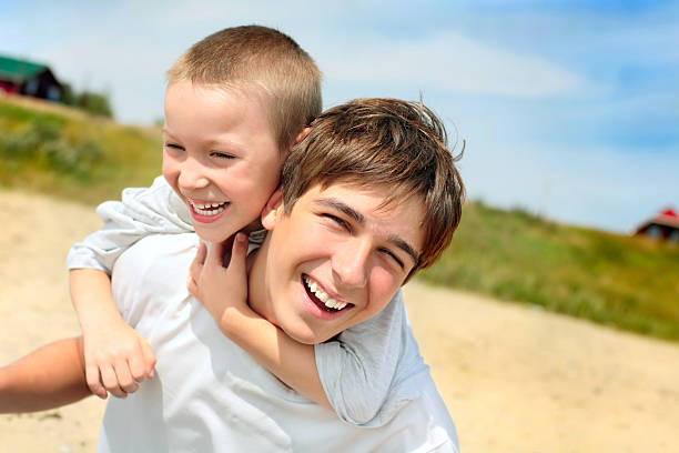istock happy teenager and kid 95186537