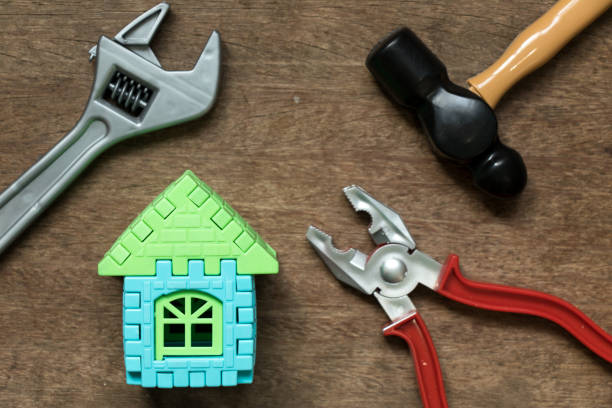 istock Home model object with toy equipment tool on wood background (Concept for home repair or fix) 951875252