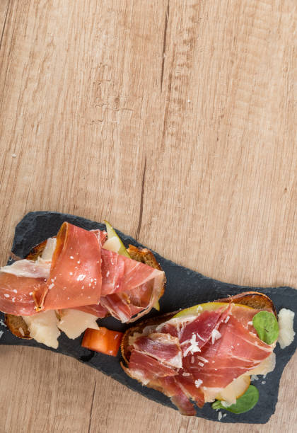 istock Italian snack, bruschetta on slate dish 951878980