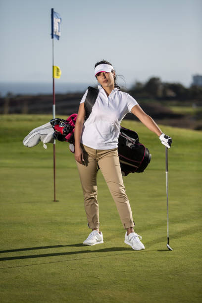 istock Confident woman in golf uniform 951880692