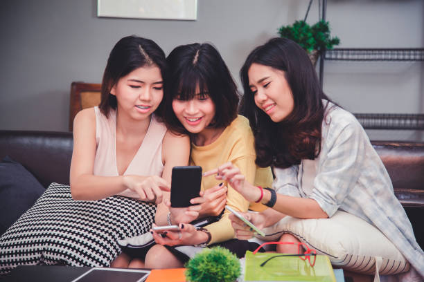istock Group young women Shopping Online Concept. 951881590