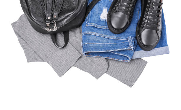 istock Sneakers backpack jeans and a light sweater. 951888642