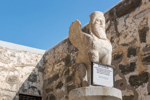 Close up of black granite Egyptian sphinx sitting on Peristyle, central square of the Diocletian palace in Split, Croatia