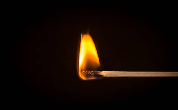 istock Photo of burning matchstick. 951893660
