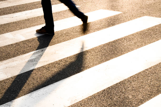 istock One pedestrian crossing the street 951895820
