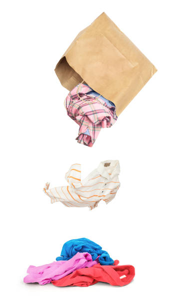 istock Clothes falling out of the package isolated on white background 951896252