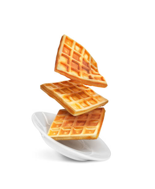 istock Belgian waffles on a plate isolated on a white background 951899886
