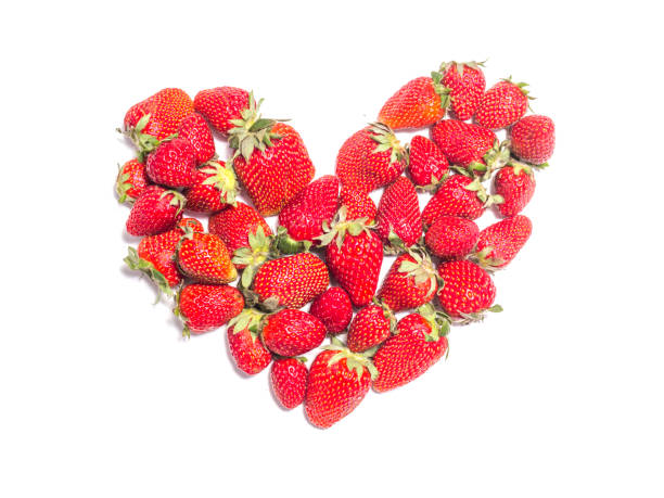 istock Heart of strawberry on white background 951899896
