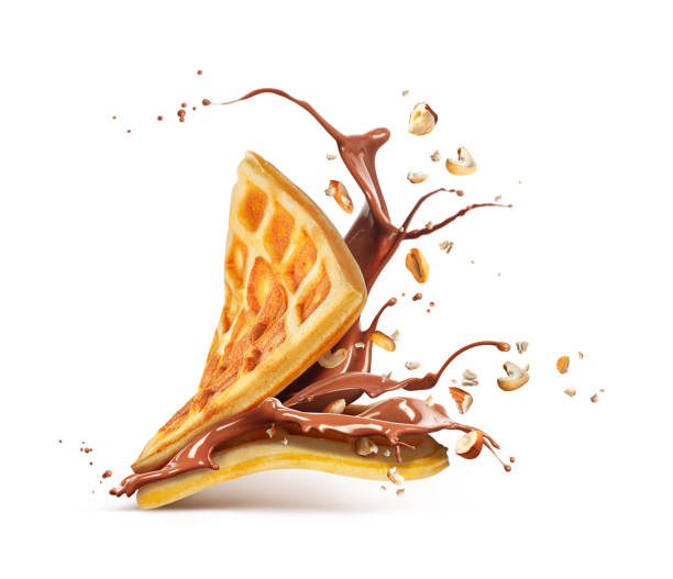 istock Belgian waffles with chocolate and nuts isolated on a white background 951900862