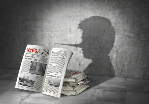 News concept. Fake news. Newspapers cast shadow in form of liar. 3d illustration
