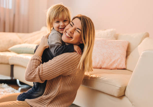 istock Affectionate mother and her small son in the living room. 951909002
