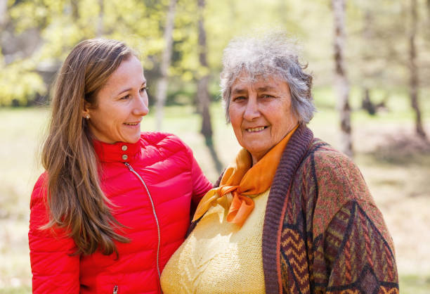 istock Happy elderly woman with her daughter 951911948