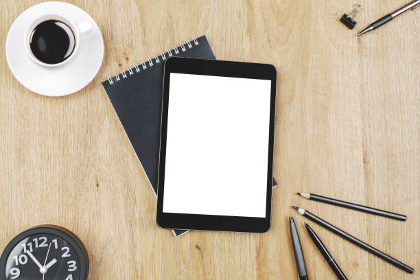 istock Wooden desktop with white tablet 951913716