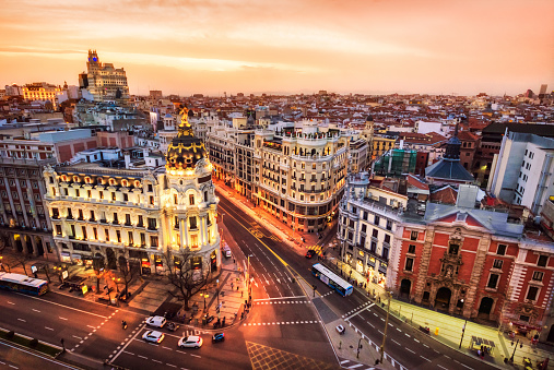 Aerial view of Gran Via in Madrid at dusk from Circulo de Bellas artes. Spain