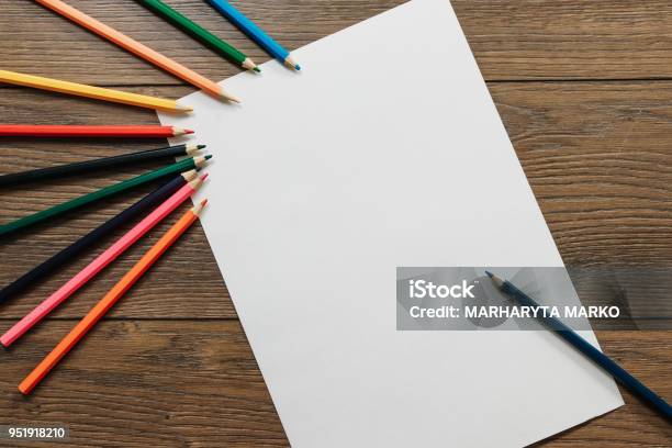 https://media.istockphoto.com/id/951918210/photo/hands-of-the-artist-close-up-holds-a-pencil-over-a-blank-sheet-of-paper-near-scattered-colored.jpg?s=612x612&w=is&k=20&c=5iv5DnqZjaE0NZ44O9OSPnYSTA6VRhi_McczZYAoAR4=