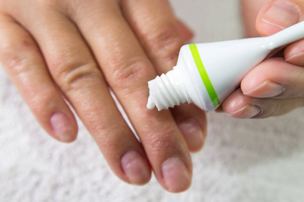 istock Cream close up on hand in a blur . 951921646