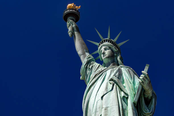istock Statue of liberty in New York on blue sky 951924932