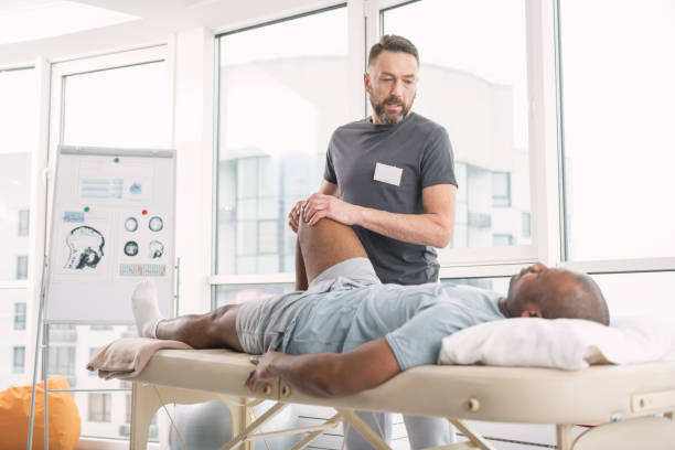 istock Smart skilled doctor looking at his patient 951924978