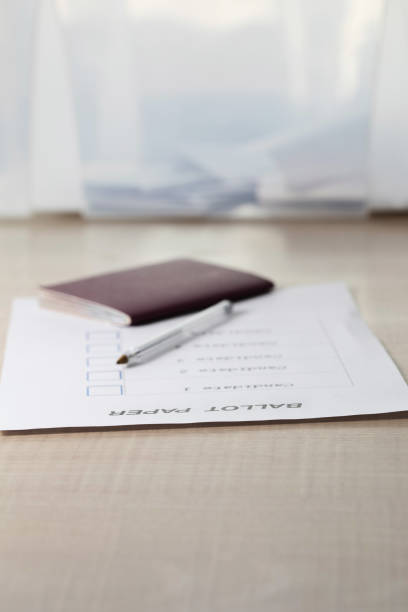 istock Referendum ballot paper, black pen, and passport on the table. 951929428