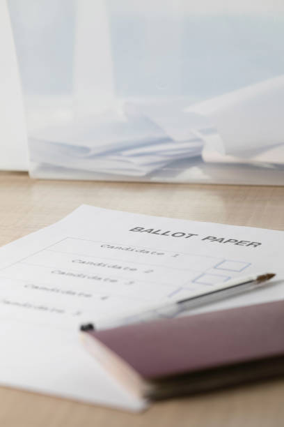 istock Referendum ballot paper, black pen, and passport on the table. 951929430