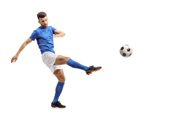 istock Soccer player kicking a football 951937264