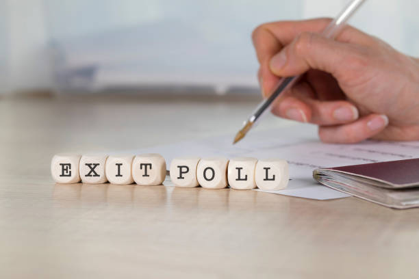 istock Word EXIT POLL composed of wooden letters. 951938088