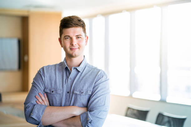 istock Portrait of confident smiling executive at office 951946564