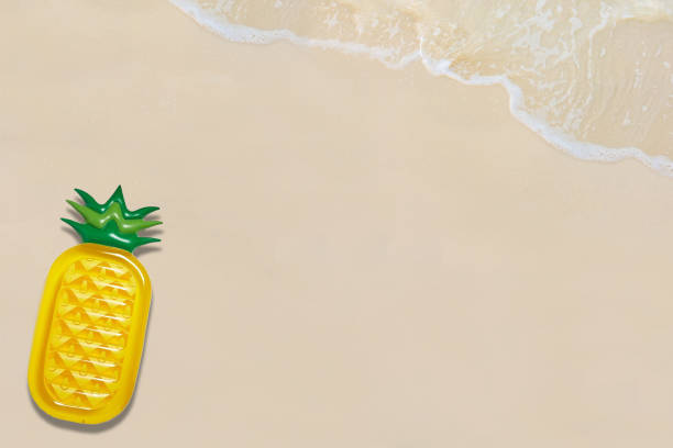 istock Pool float, Top view of ring on the beach. Summer vacation concept. 951948422