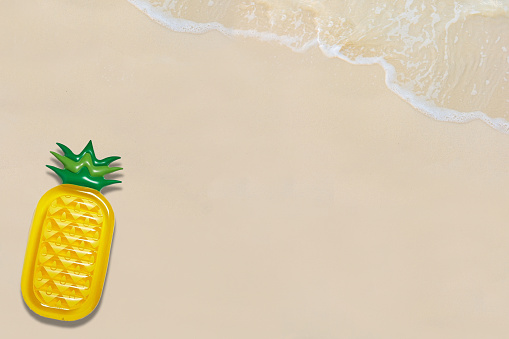 Pool float, Top view of ring on the beach. Summer vacation concept.