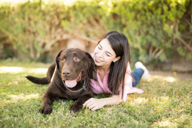 istock Hispanic woman with dog 951952292